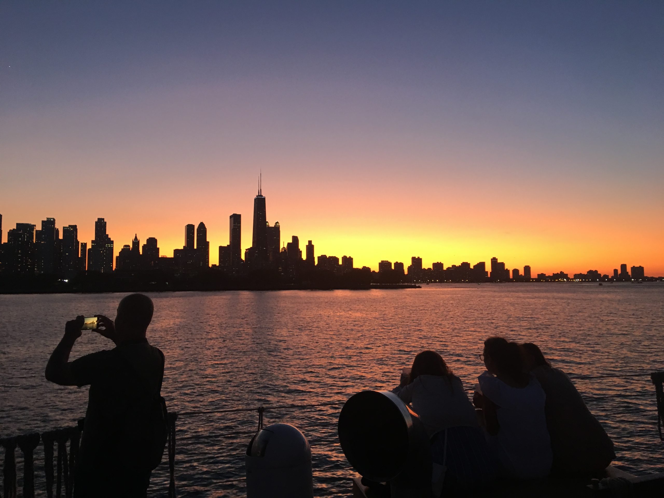 a sunset over a body of water